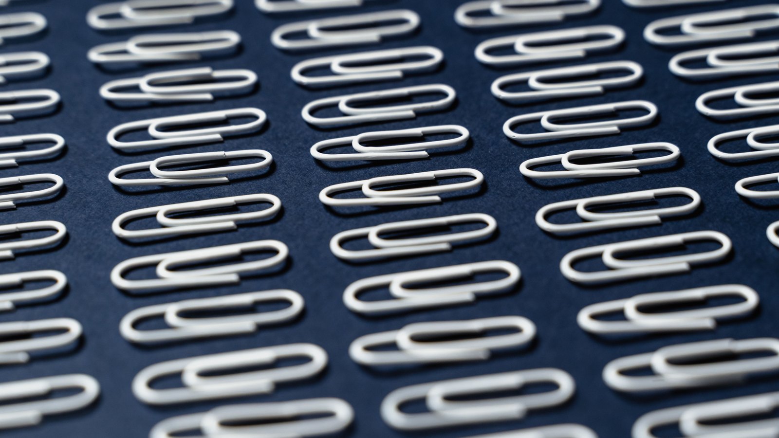 A photograph illustrating paper clips macro.