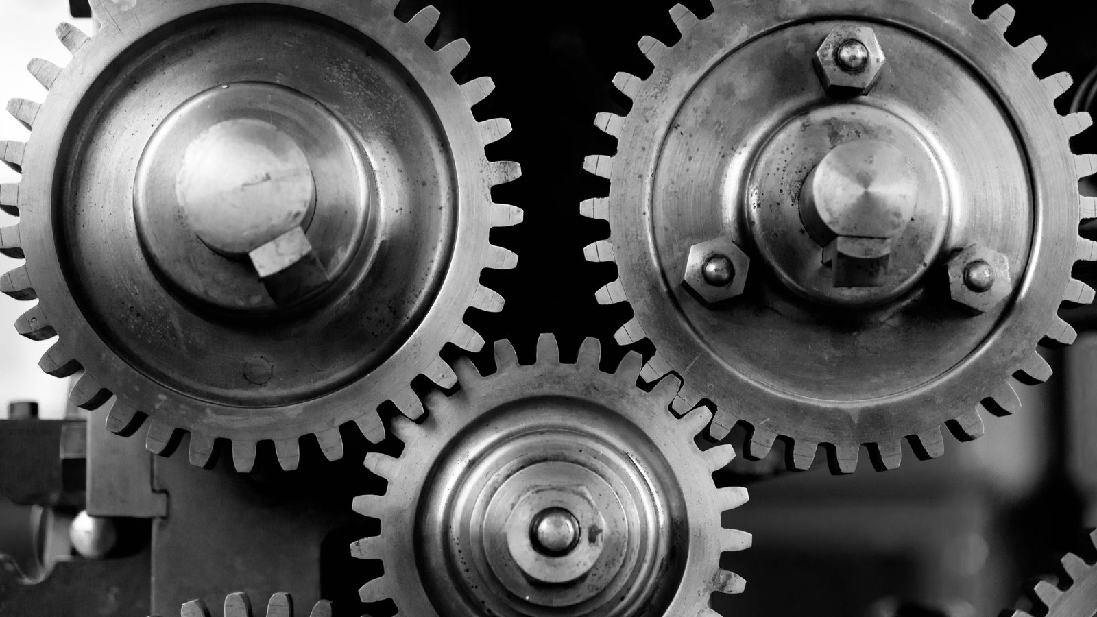 A photograph illustrating machined metal gears macro.
