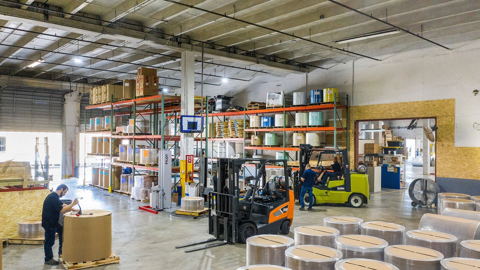 A photograph illustrating warehouse forklift pallets.