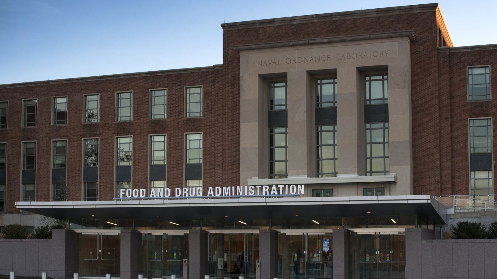 The entrance to the Food and Drug Administration campus at White Oak in Silver Spring, Maryland, with the agency name above the doors.