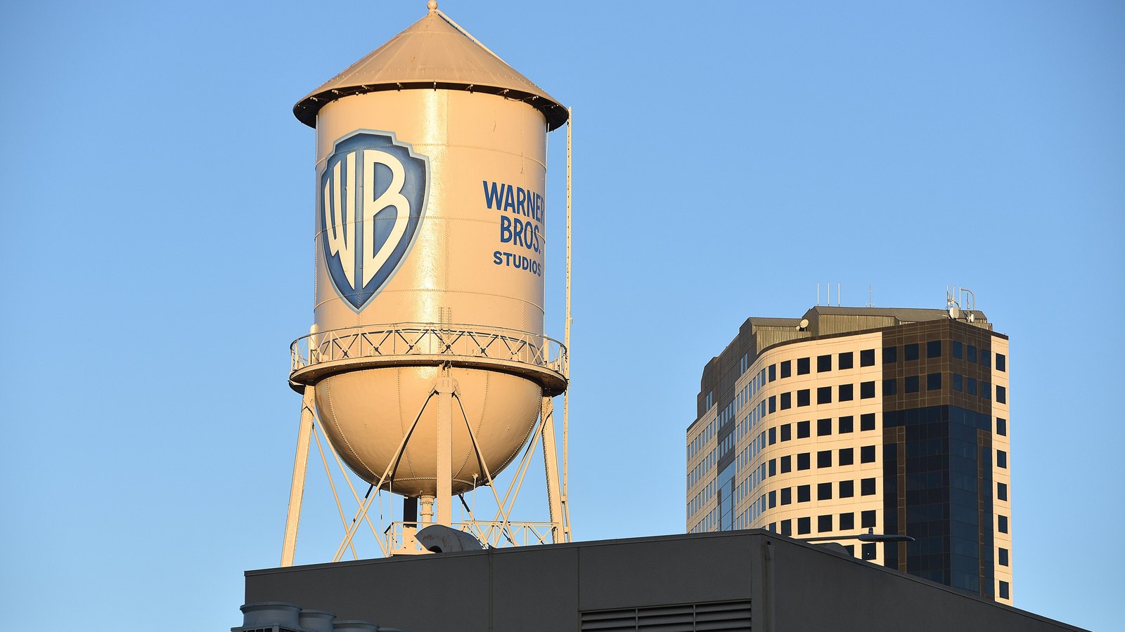 The Warner Bros. Studios water tower rises above buildings in Burbank, California.