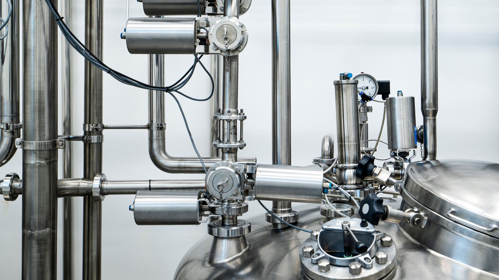 A photograph illustrating steel pipeline valves.