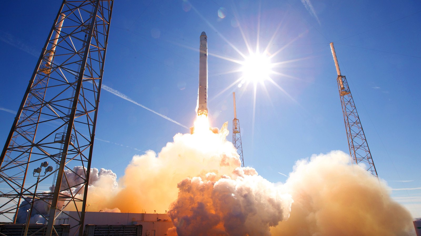 A Falcon 9 rocket lifting off.