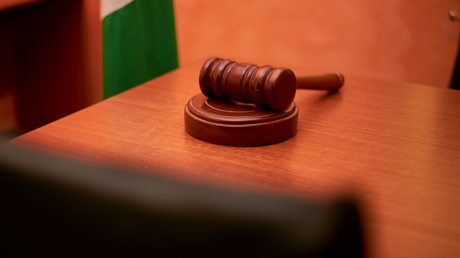 A gavel on a desk.