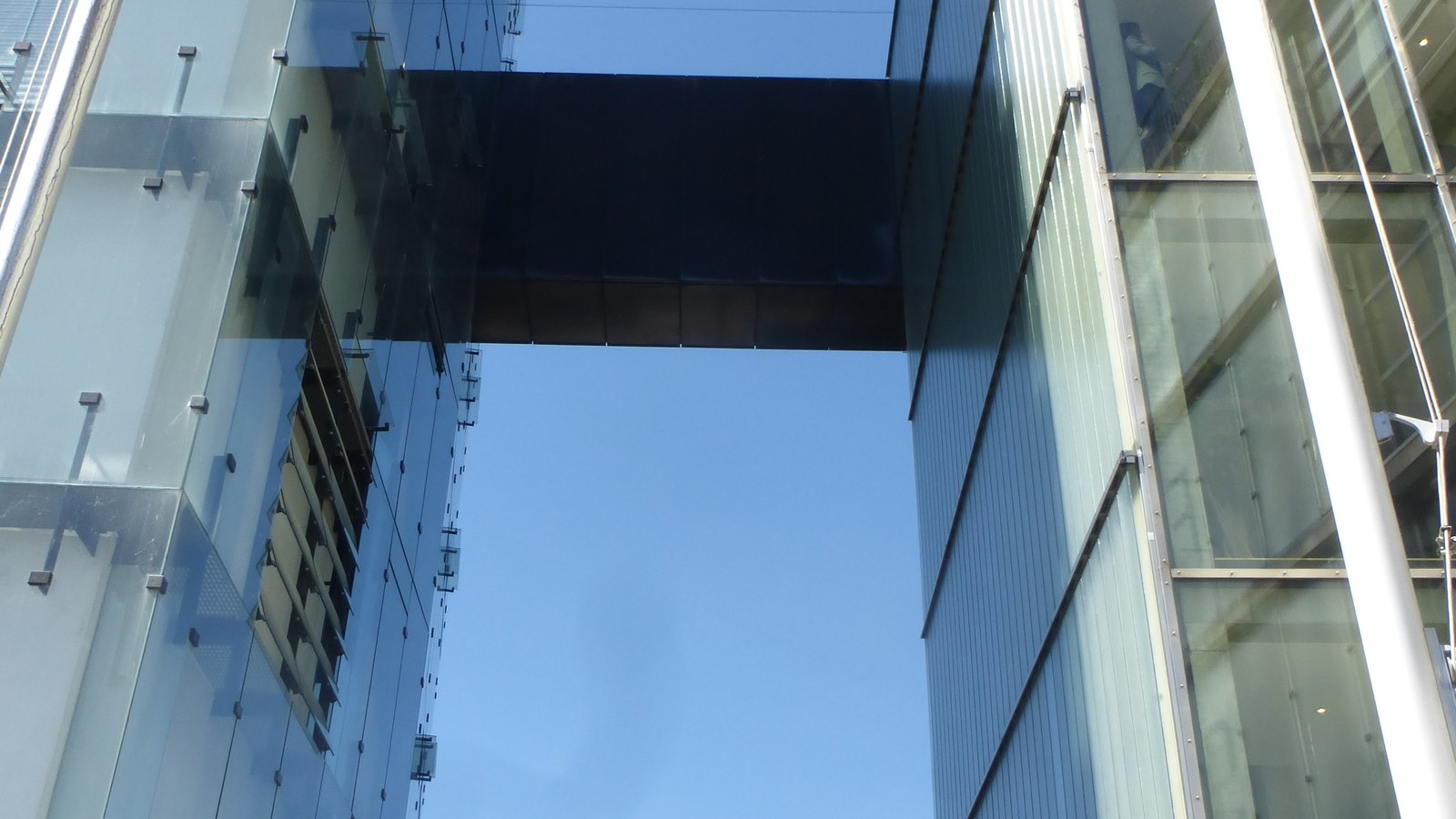 A glass skybridge links buildings at the Swiss Federal Statistical Office complex in Neuchâtel.