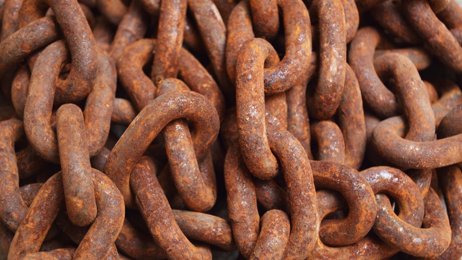 A photograph illustrating steel chain links closeup.