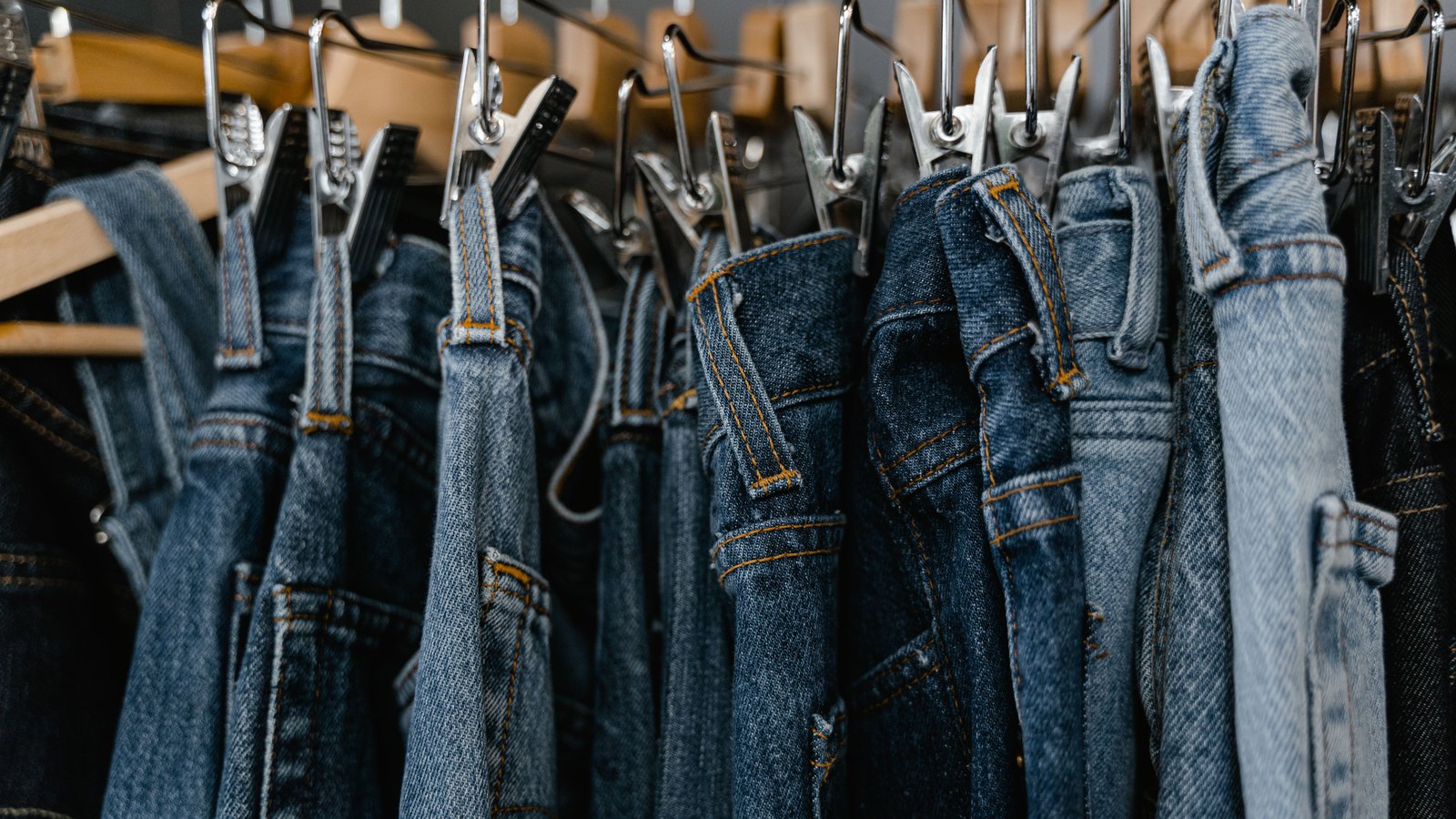 A photograph illustrating clothing on rack.