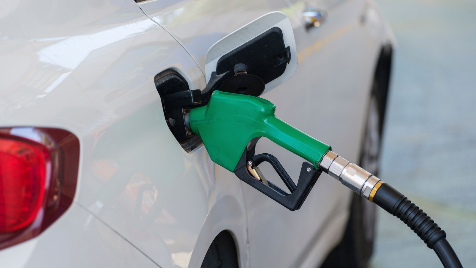 A photograph illustrating diesel fuel nozzle closeup.
